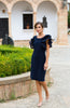 Frank Lyman Montreal Navy dress with ruffled shoulder detail.