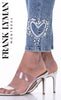 Denim blue jeans with crystal stone heart detail on hem