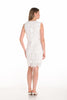 Woman wearing a white lace dress on a white background