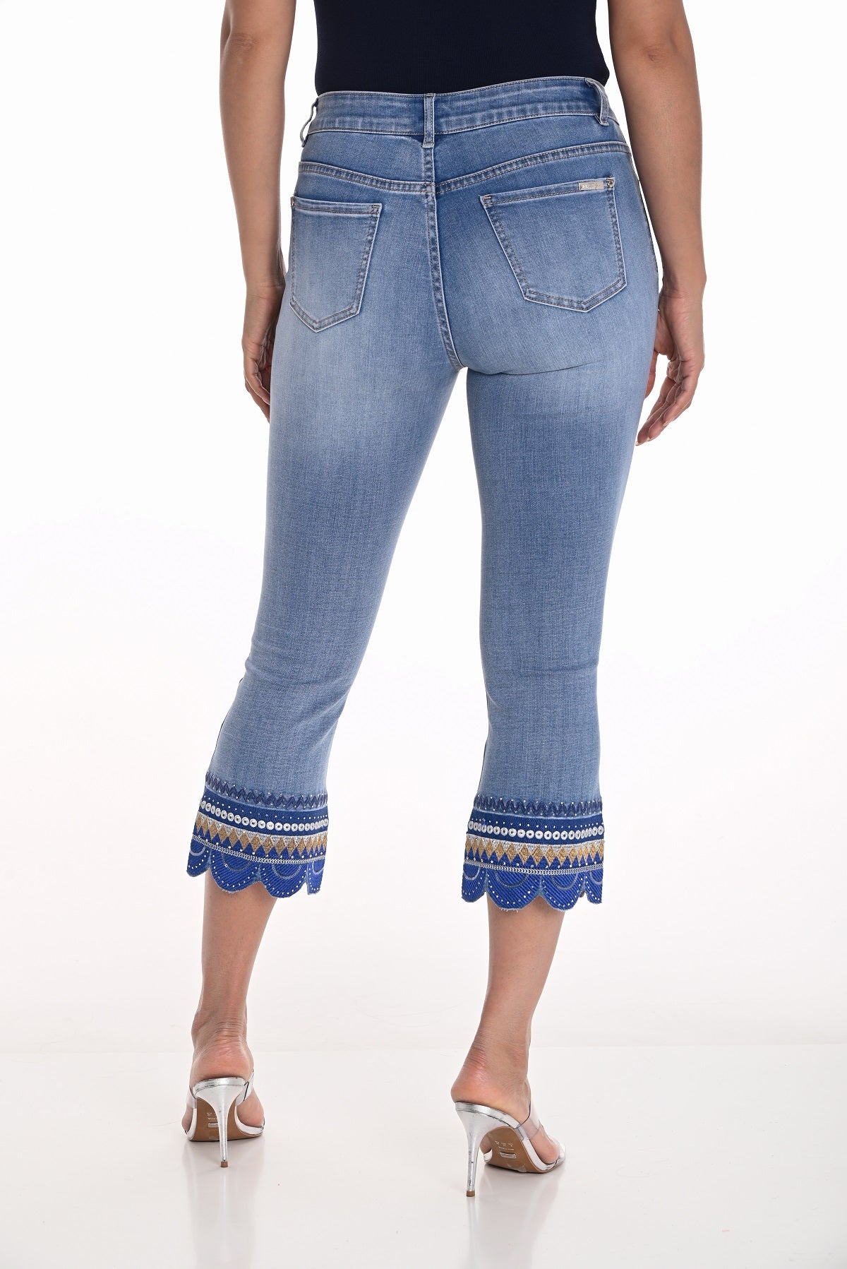 Crop mid rise skinny jeans with sequin scalloped hem detail