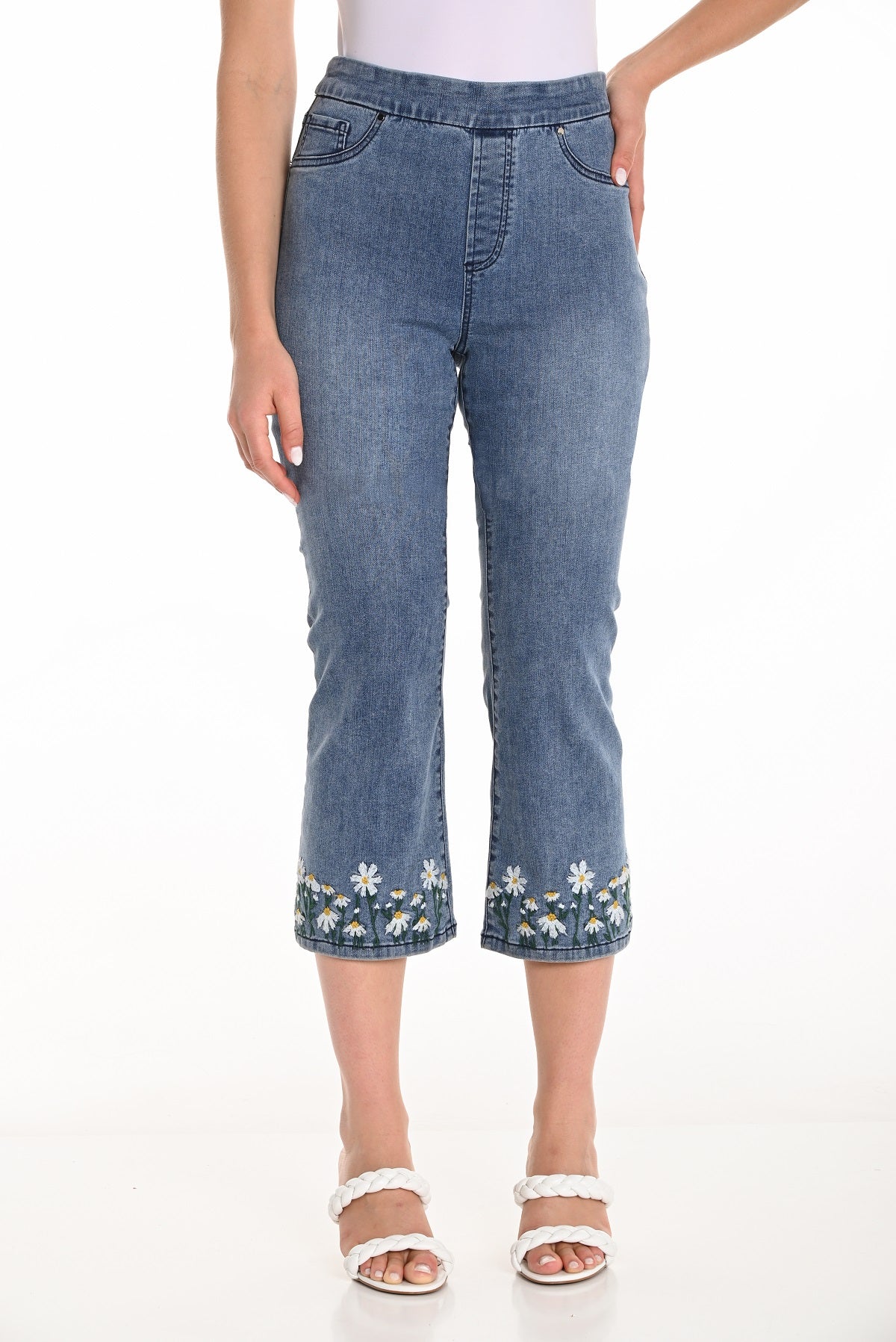 Frank Lyman straight leg cropped pull on jeans with floral hem detail.