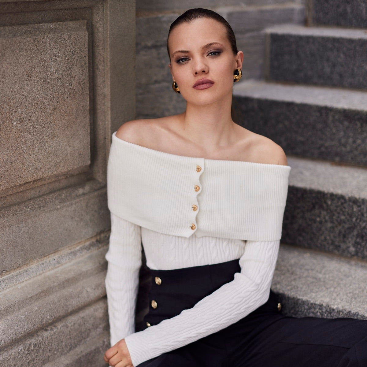 Black pull on pant with gold button detail in 32 inch inseam.