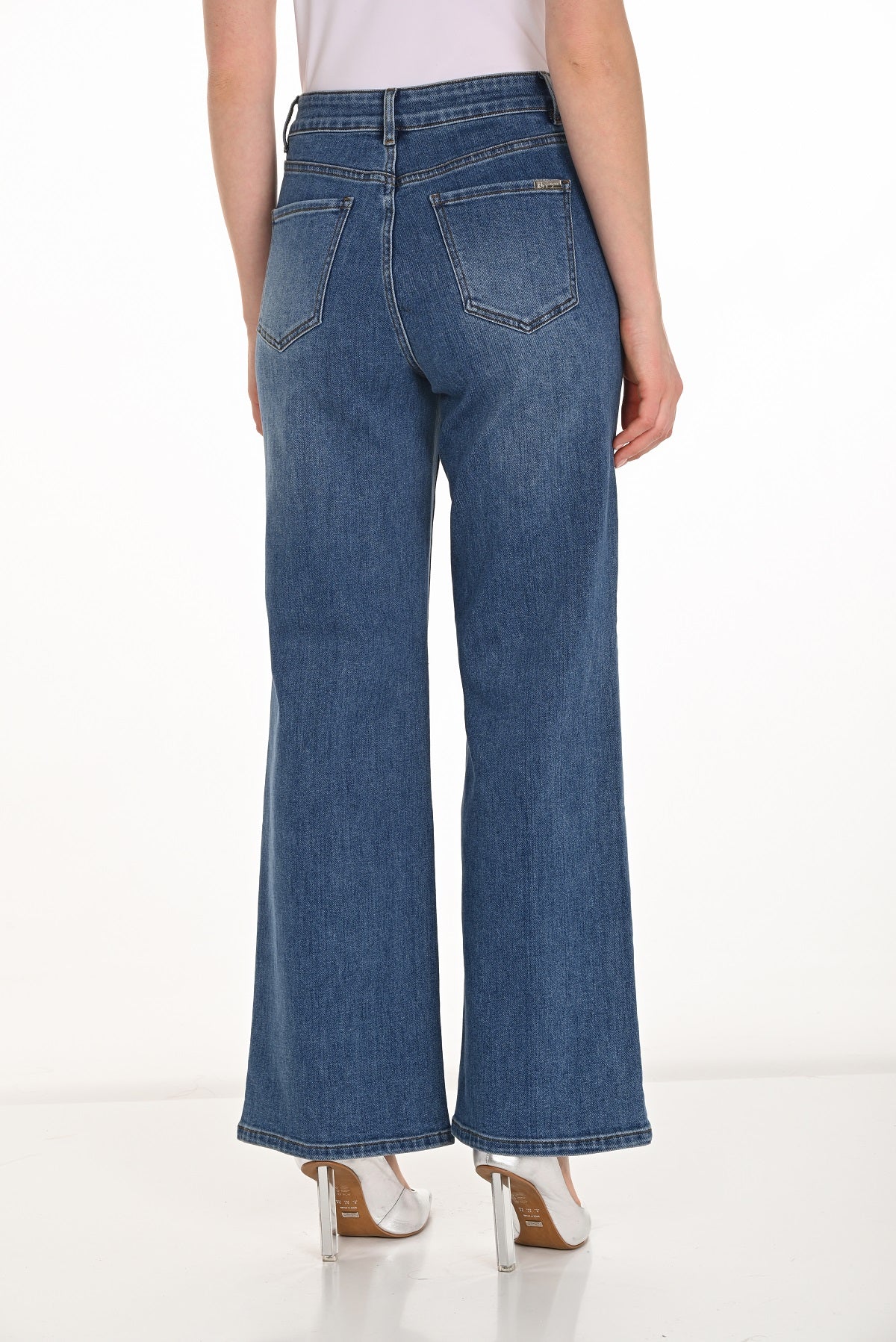 High rise blue jeans with striking crystal stone bow detail in full length with wide leg