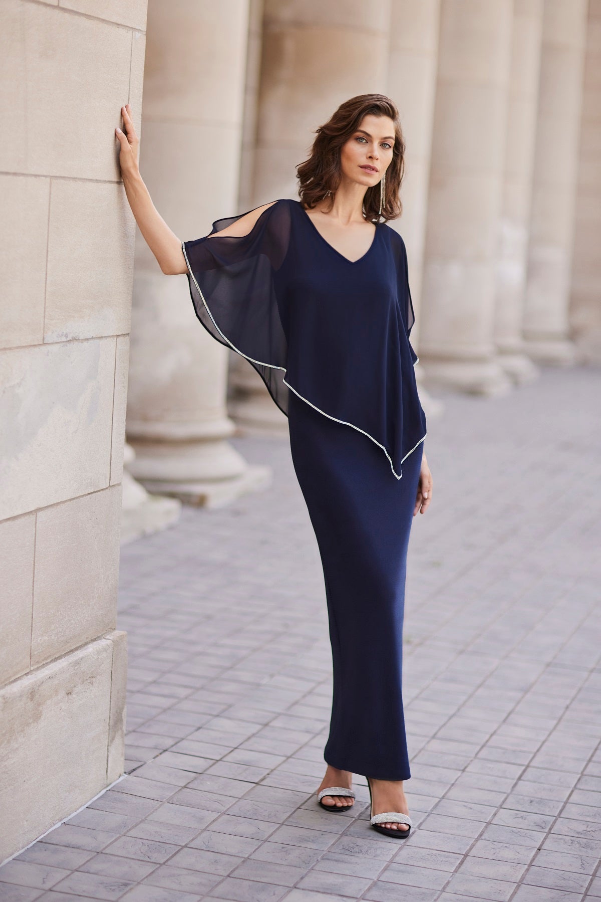 Midnight blue evening gown with embellished edge overlay detail