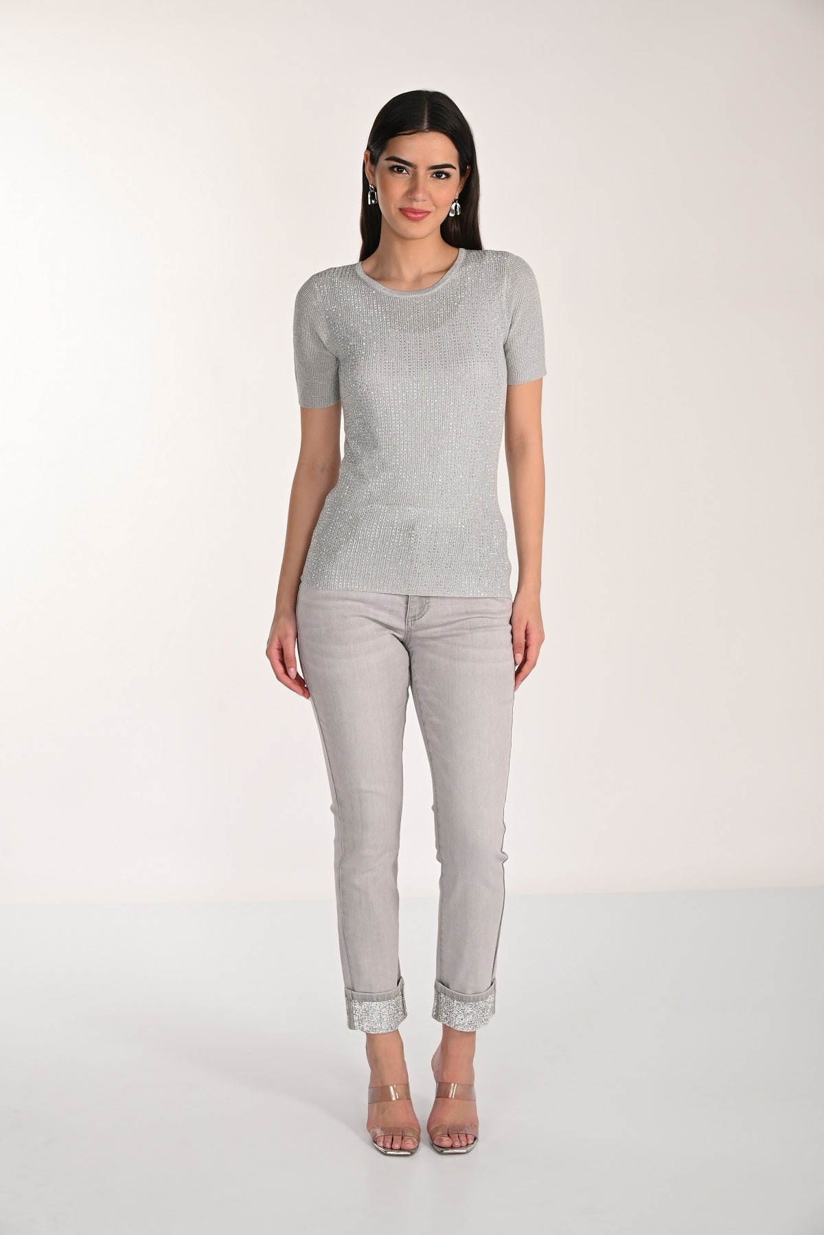 Grey skinny cropped jeans with silver embellished hem