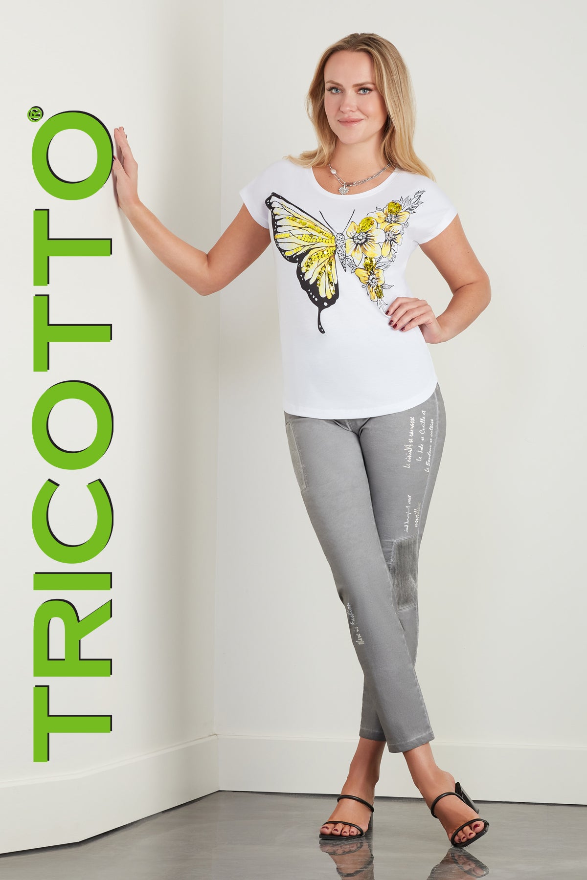 Tricotto T-shirt with sequin butterfly print on front, back is solid white