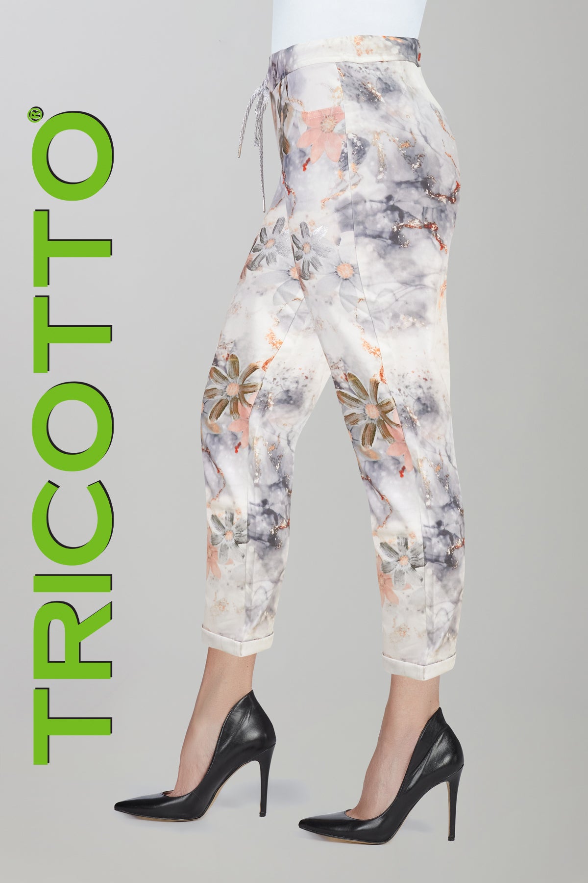 Tricotto crop length grey pink printed pant with pull on waistband.