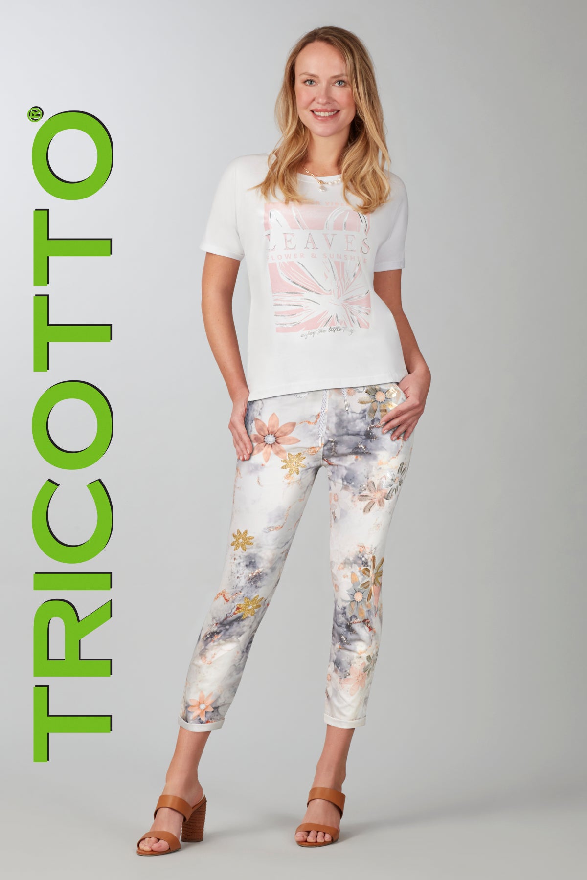 Tricotto crop length grey pink printed pant with pull on waistband.