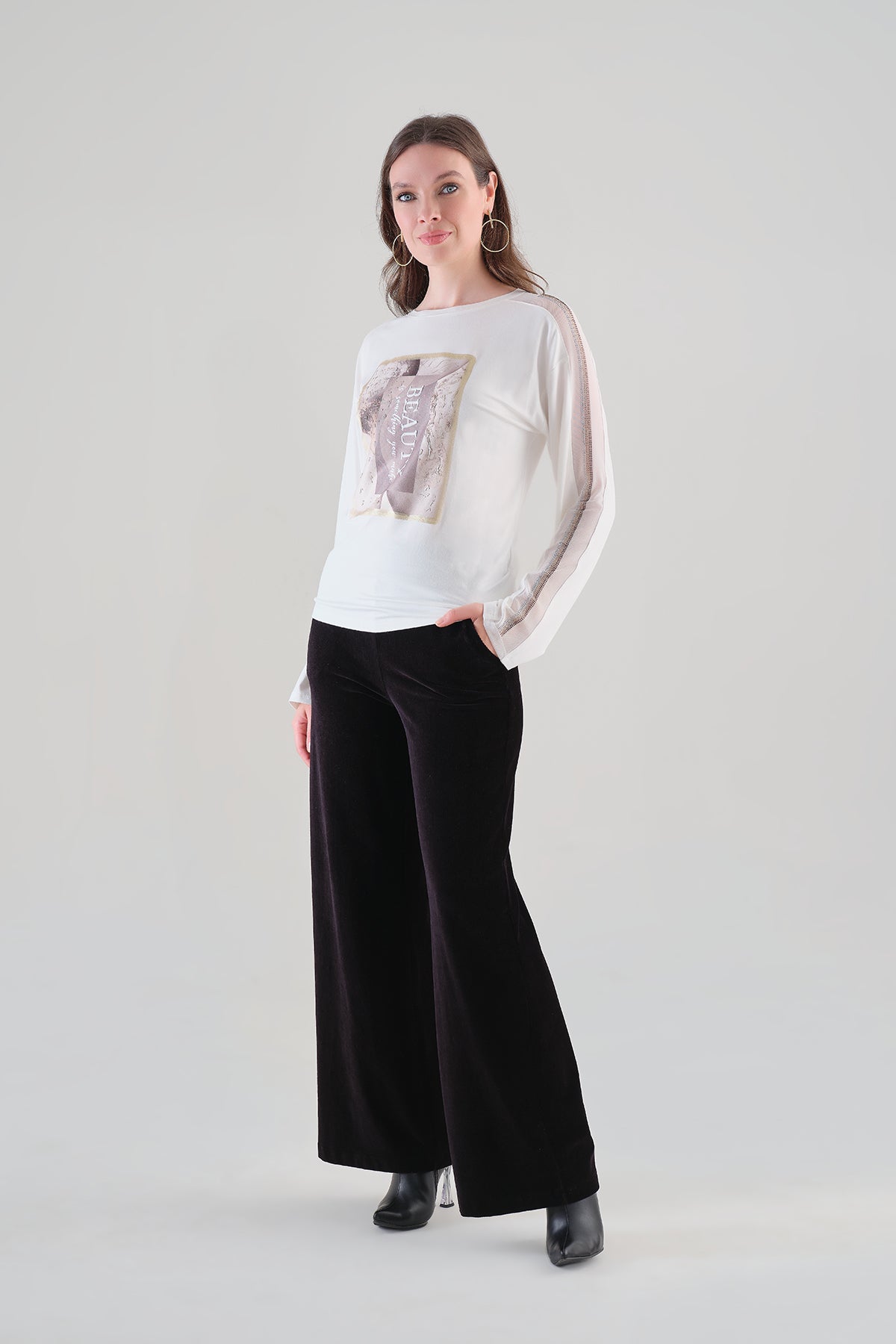 Fashion Print Sweater With Dolman Sleeve and Sequin Arm Detail. Tricotto