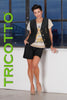 Tricotto black shimmer button front vest with front sequin detail.