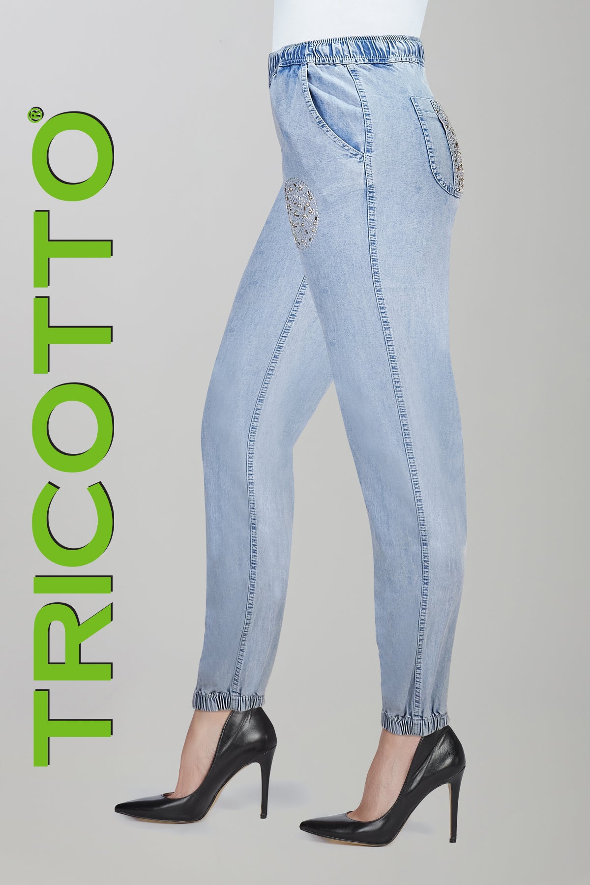 Tricotto jeans with pull on waistband and sequin pocket detail. Relaxed cargo style in soft lyocell fabric.