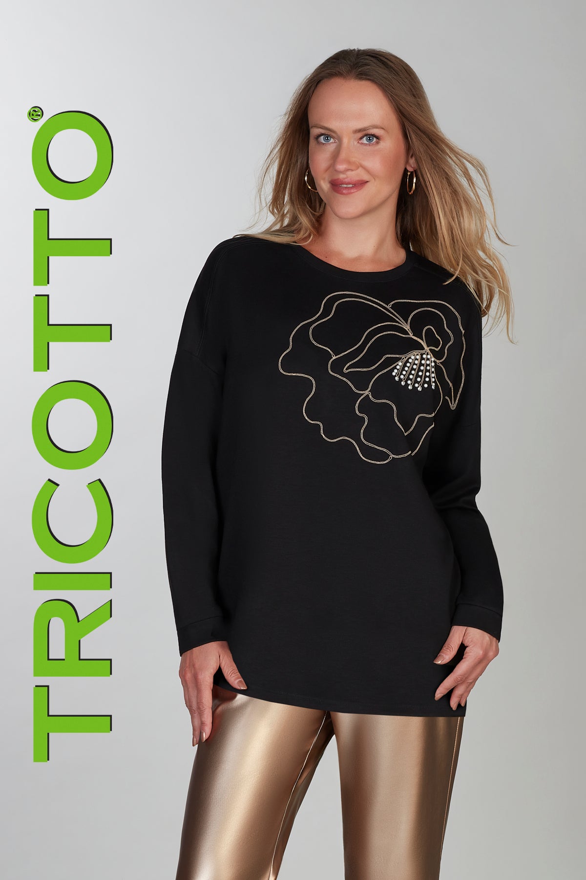Black oversized tunic with dolman sleeve and front gold sequin detail