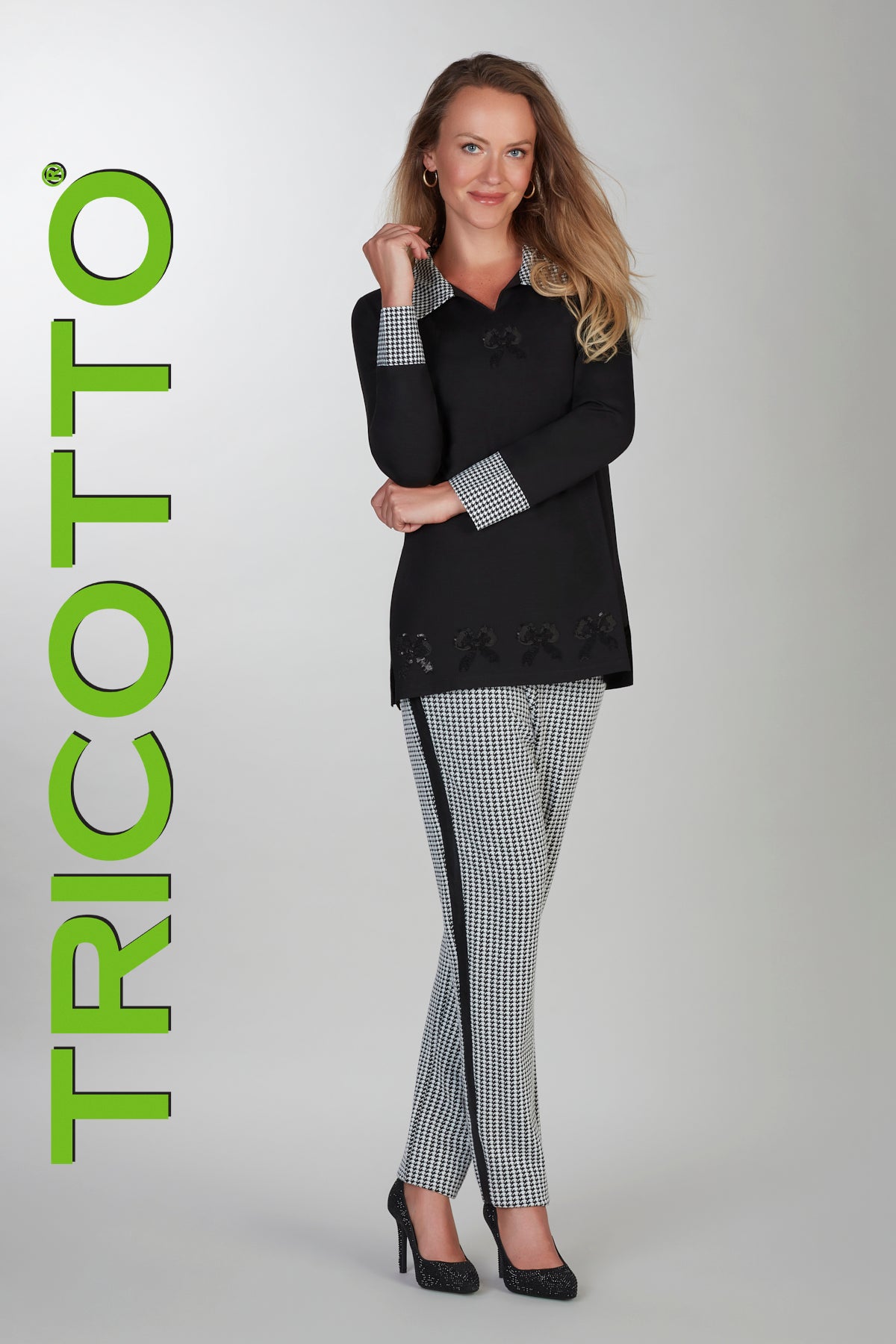 Tricotto black white pull on pant with side polyurethane detail