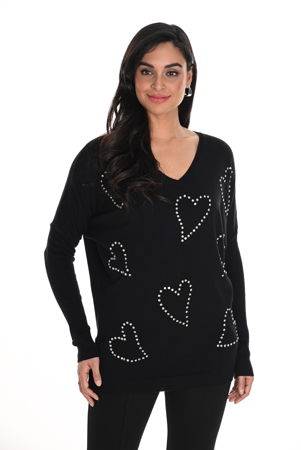 Frank Lyman Black sweater with silver crystal stone heart detail in tunic length with dolman sleeve.