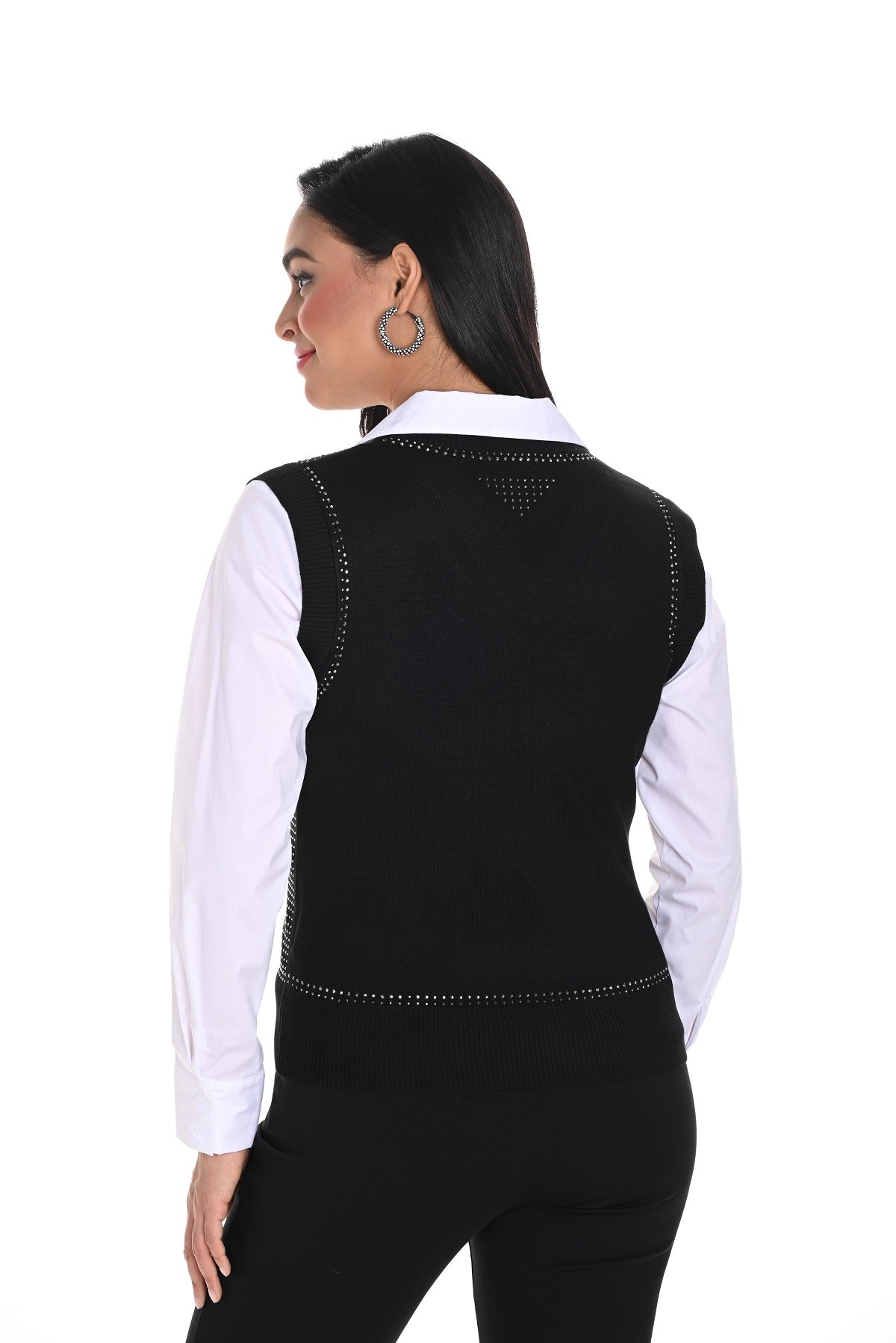 Black knit vest with front silver sequin detail.