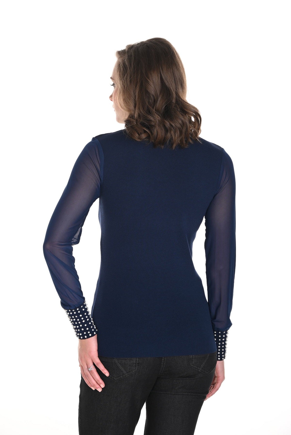 Frank Lyman Navy Mock neck sweater with sheer sleeves and white pearl detail.