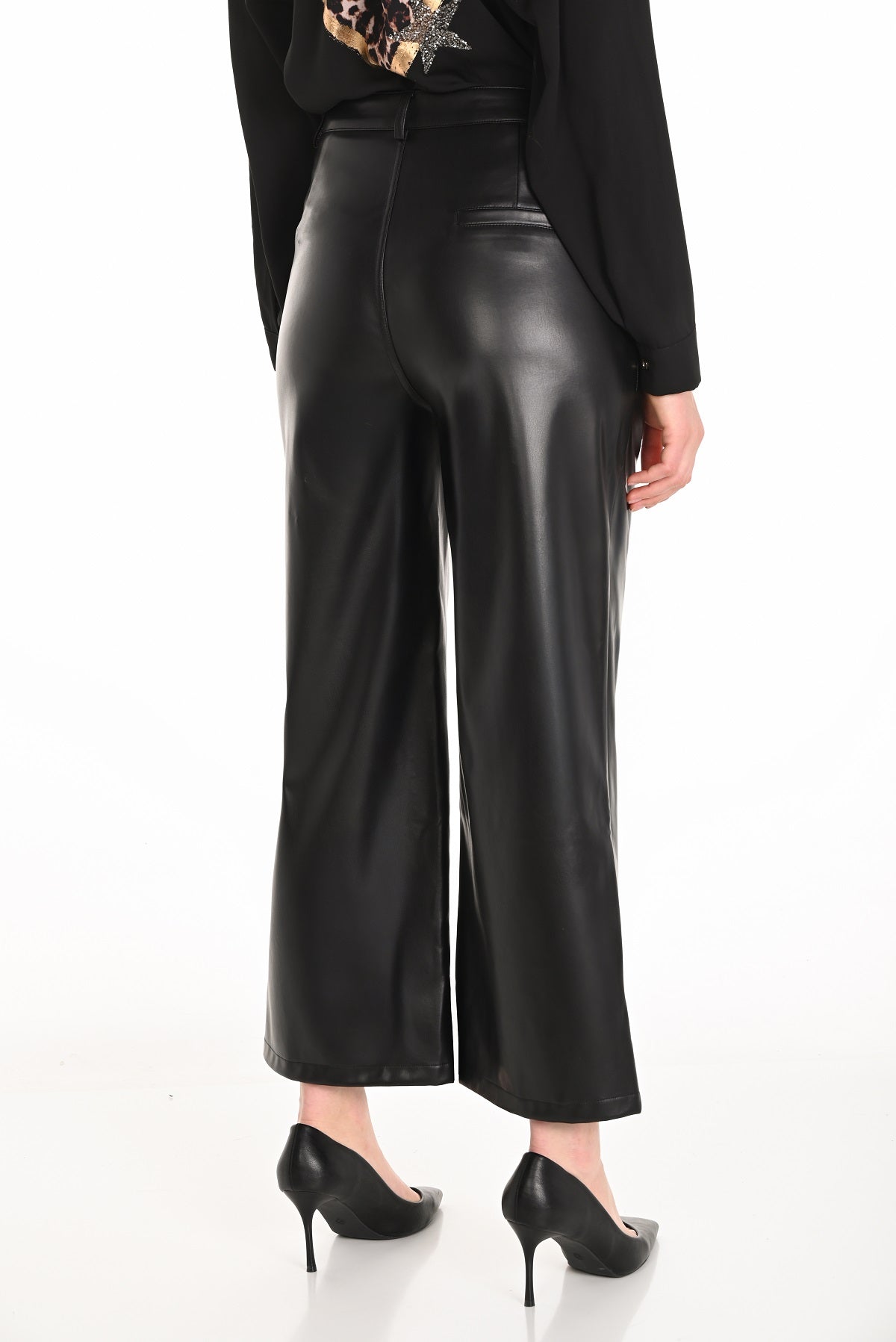 Black polyurethane wide leg pant with gold button and zip front