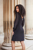 Little black evening dress with sheer trumpet arms and back embellished detail