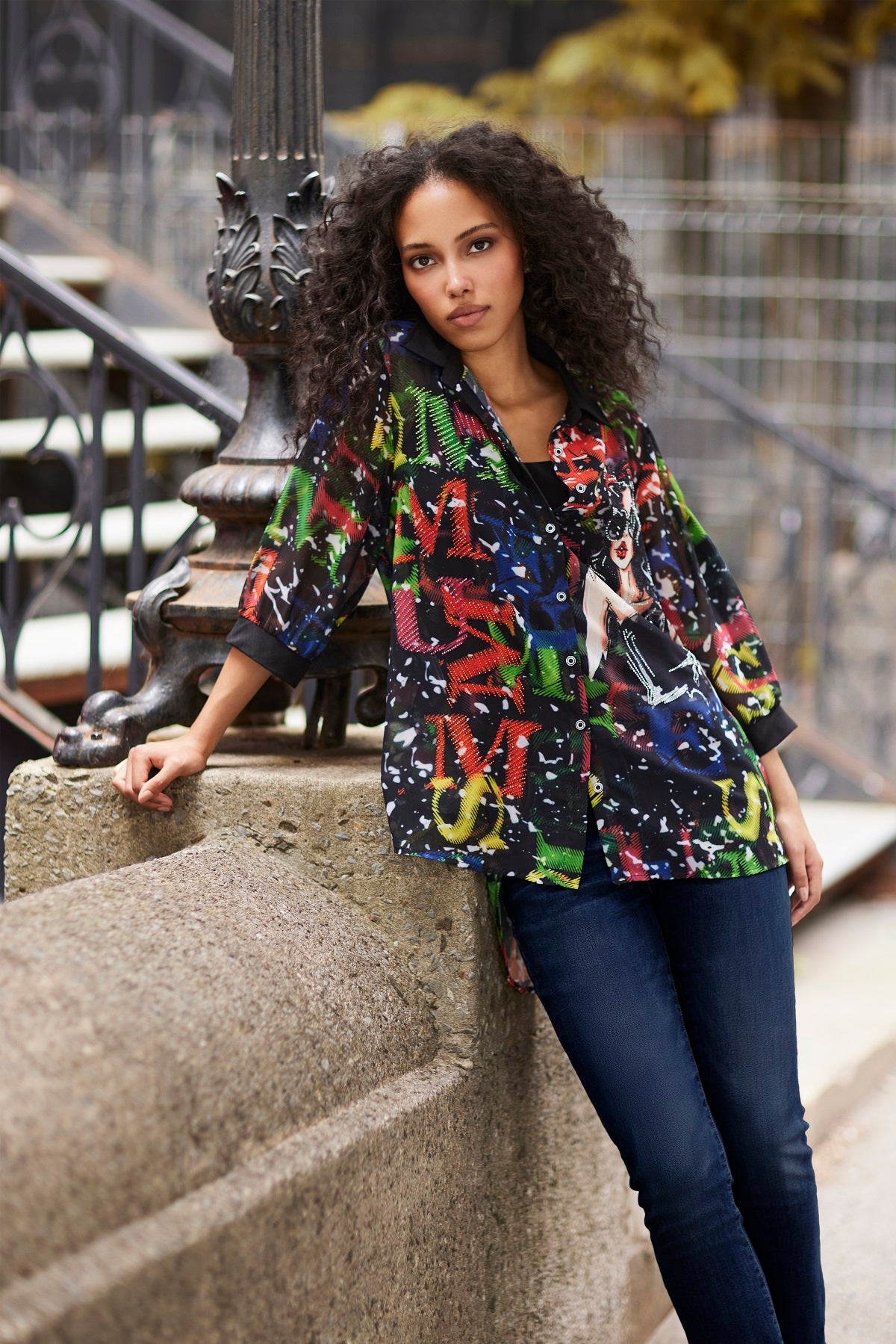 Sheer blouse with sequin print detail on front and back in flattering hi low silhouette