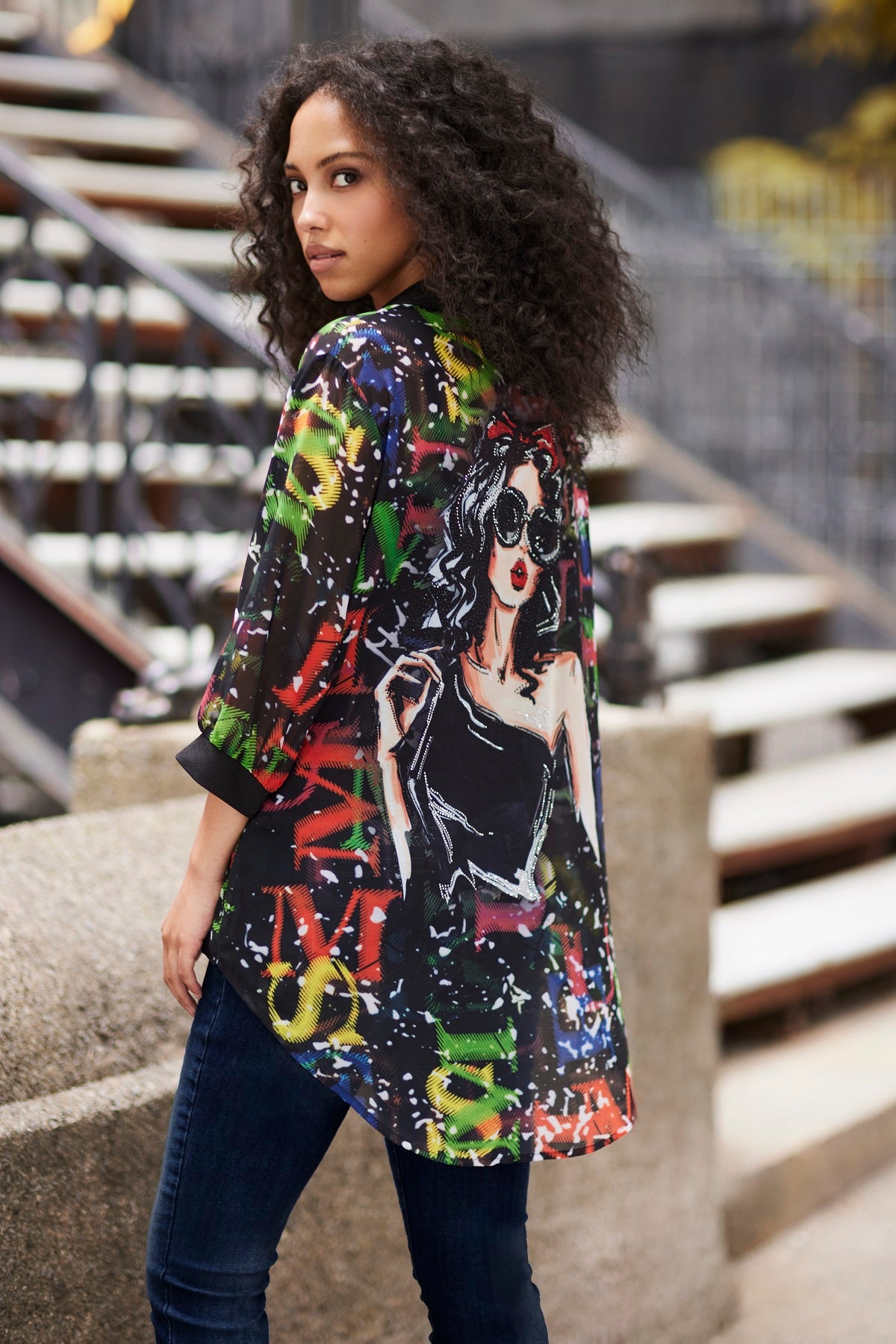 Sheer blouse with sequin print detail on front and back in flattering hi low silhouette