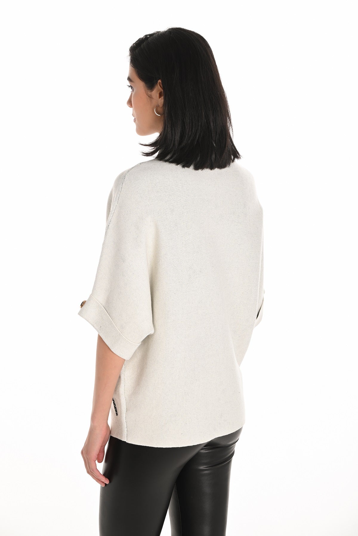 Beige black mock neck sweater with front sequin print detail