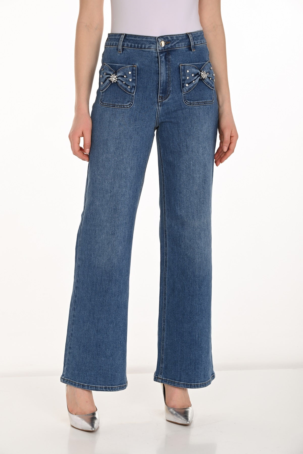 High rise blue jeans with striking crystal stone bow detail in full length with wide leg