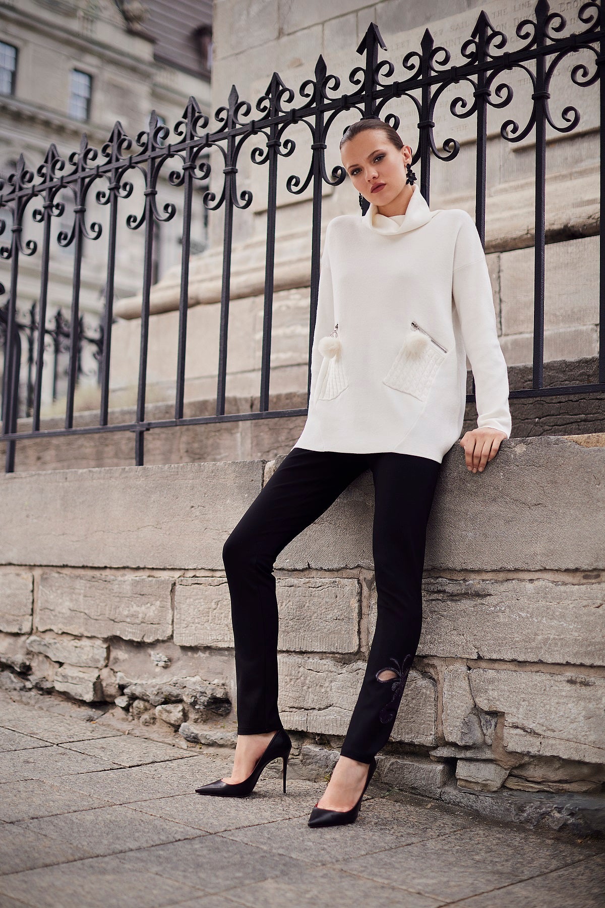 Winter white tunic sweater with mock neck and zippered pom pom pockets