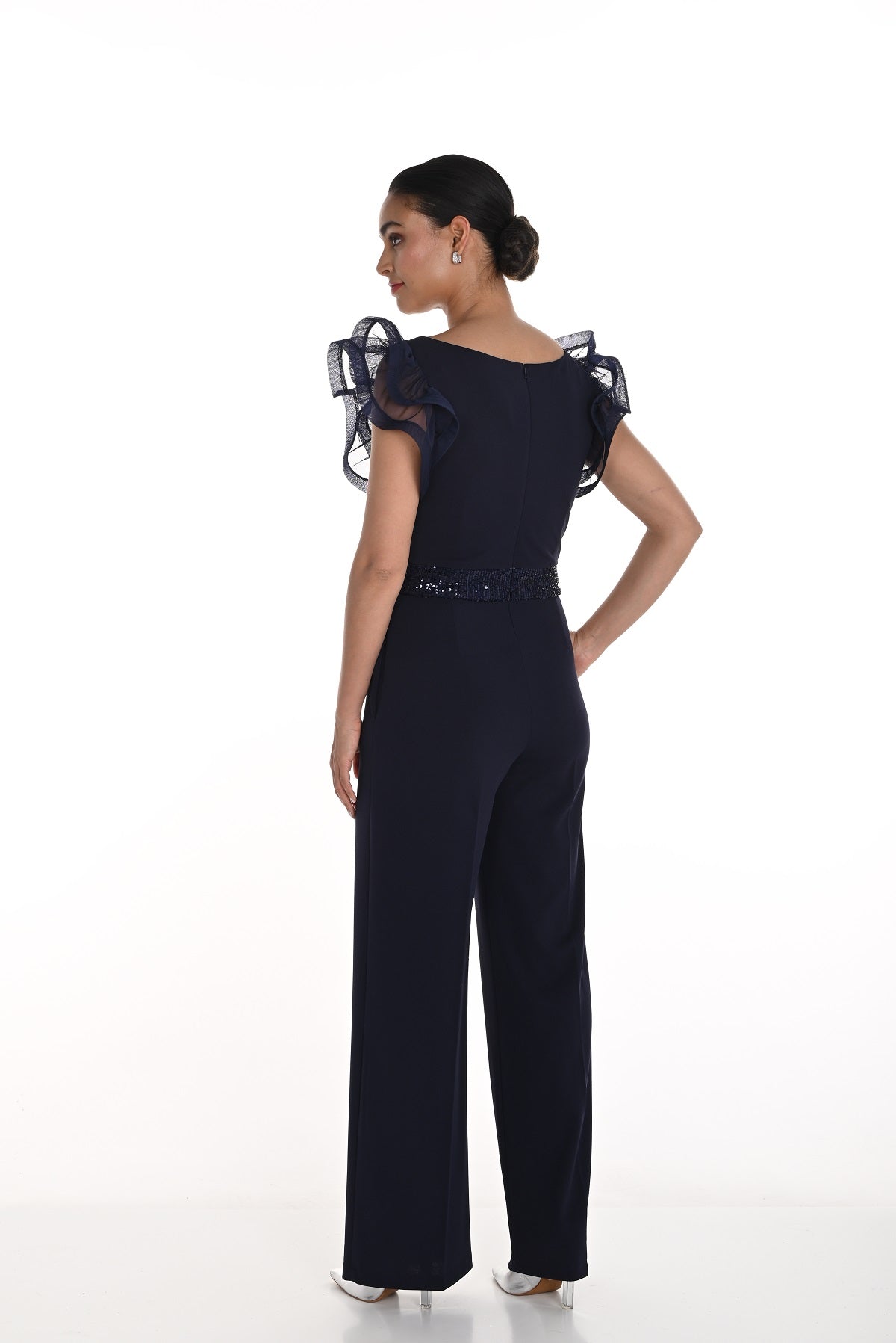 Midnight blue one piece jumpsuit with ruffled arm and sequin empire waist detail