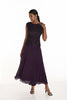 Woman wearing a purple evening gown with a sequined top on a white background