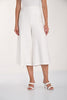 Person wearing white wide-leg pants on a plain background