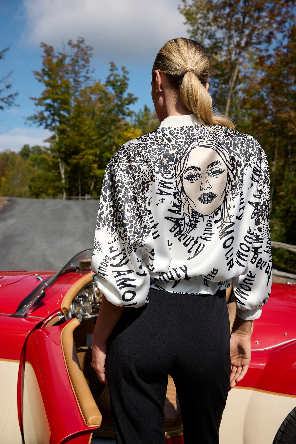 Animal print bomber jacket with sequin print detail on front and back.