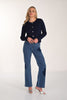 Wide leg high rise blue jeans with heart patch detail on front