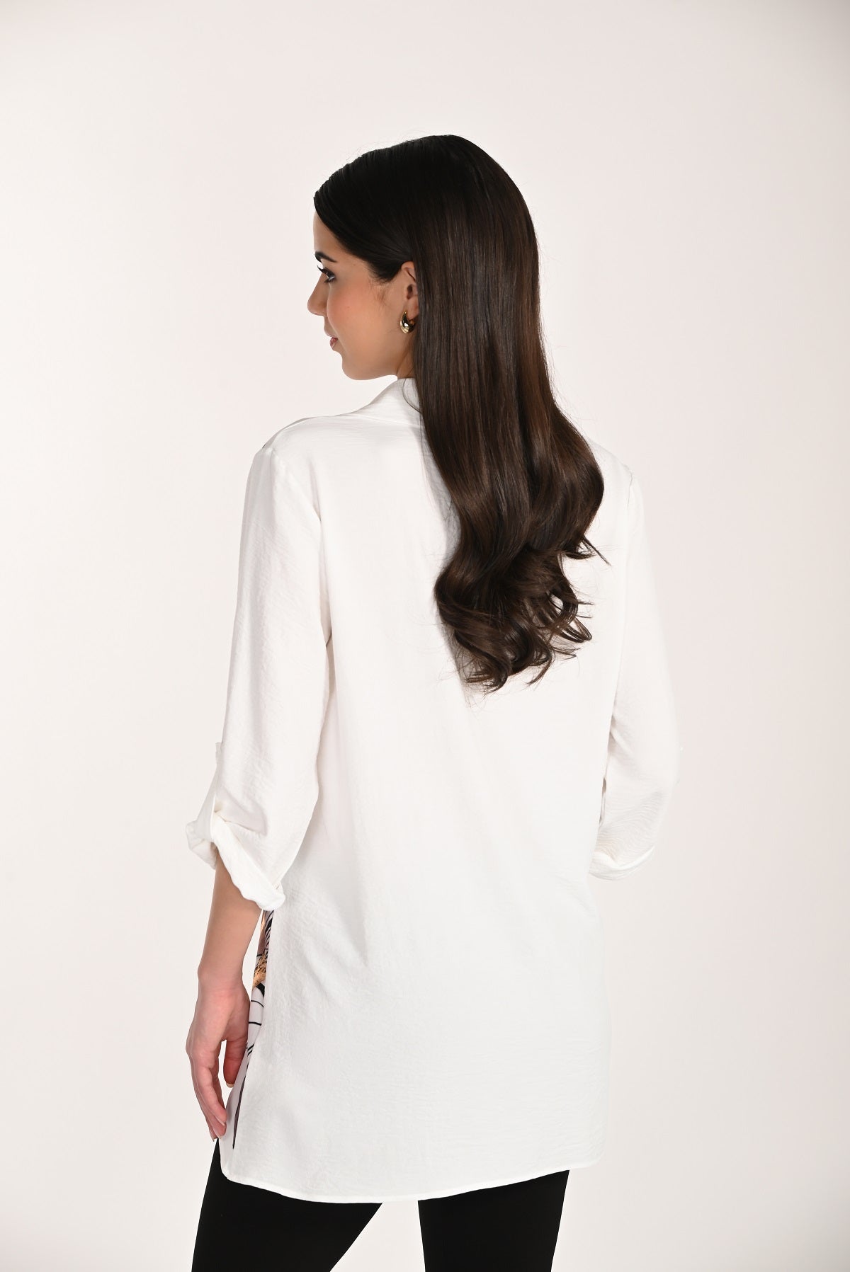 Winter white tunic length blouse with front print and accent detail