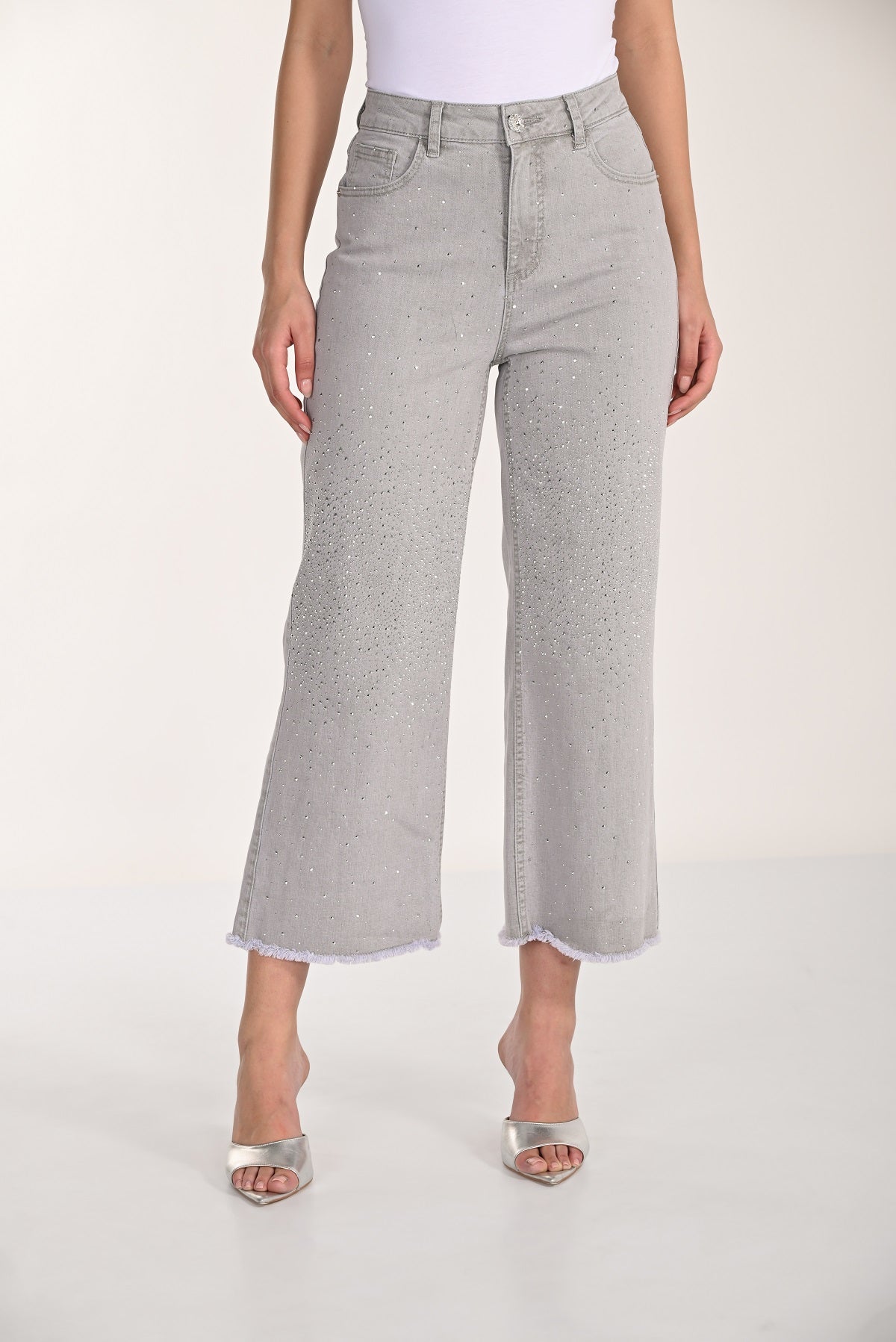 Grey wide leg cropped jeans with frayed hem and sequin front