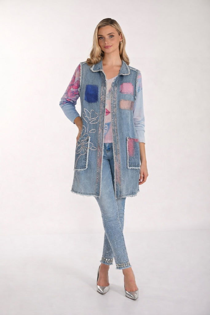 Long Sleeveless Denim Vest With Front accent Print and Frayed Detail in Light Denim Blue.