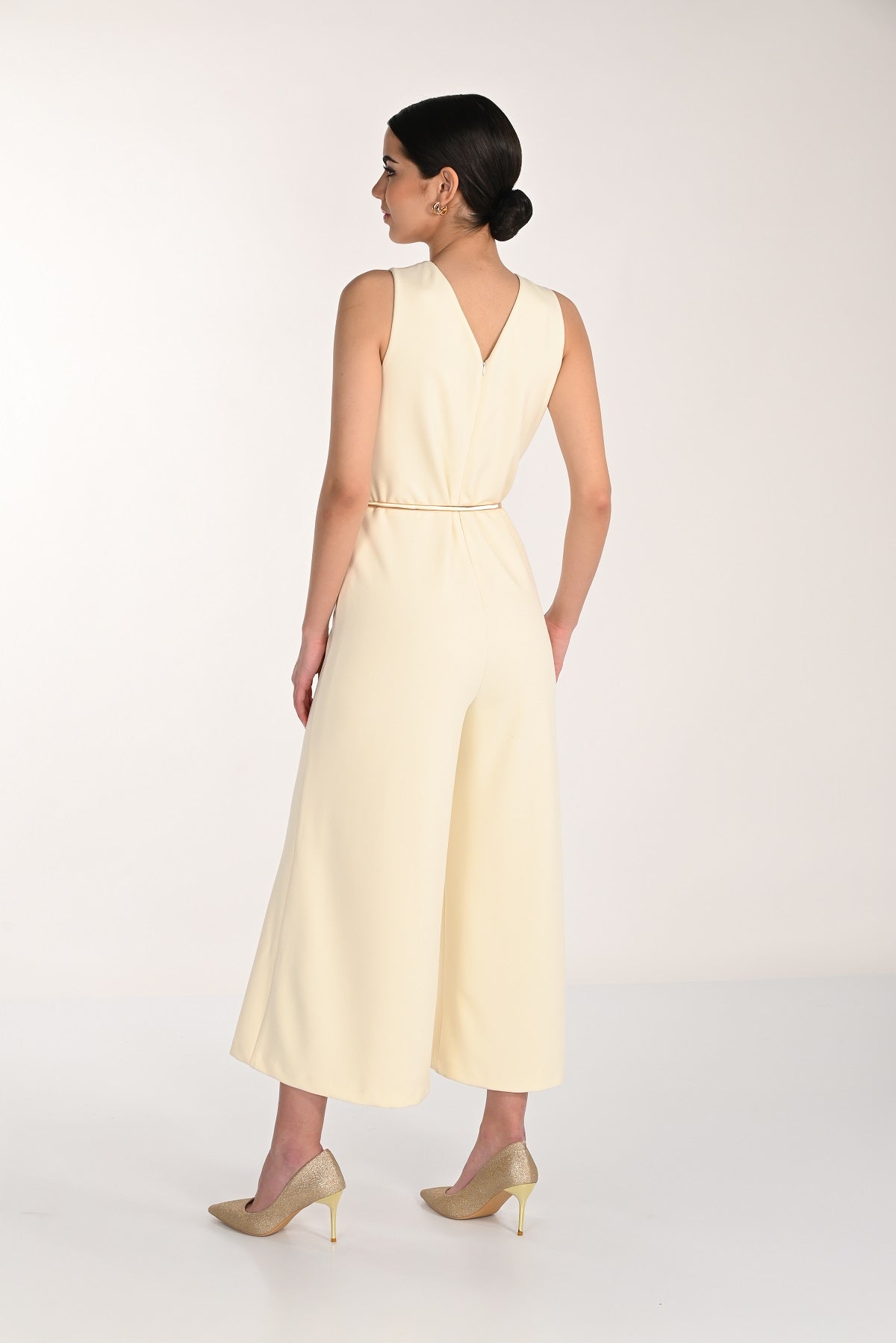 One piece evening sleeveless jumpsuit in custard yellow
