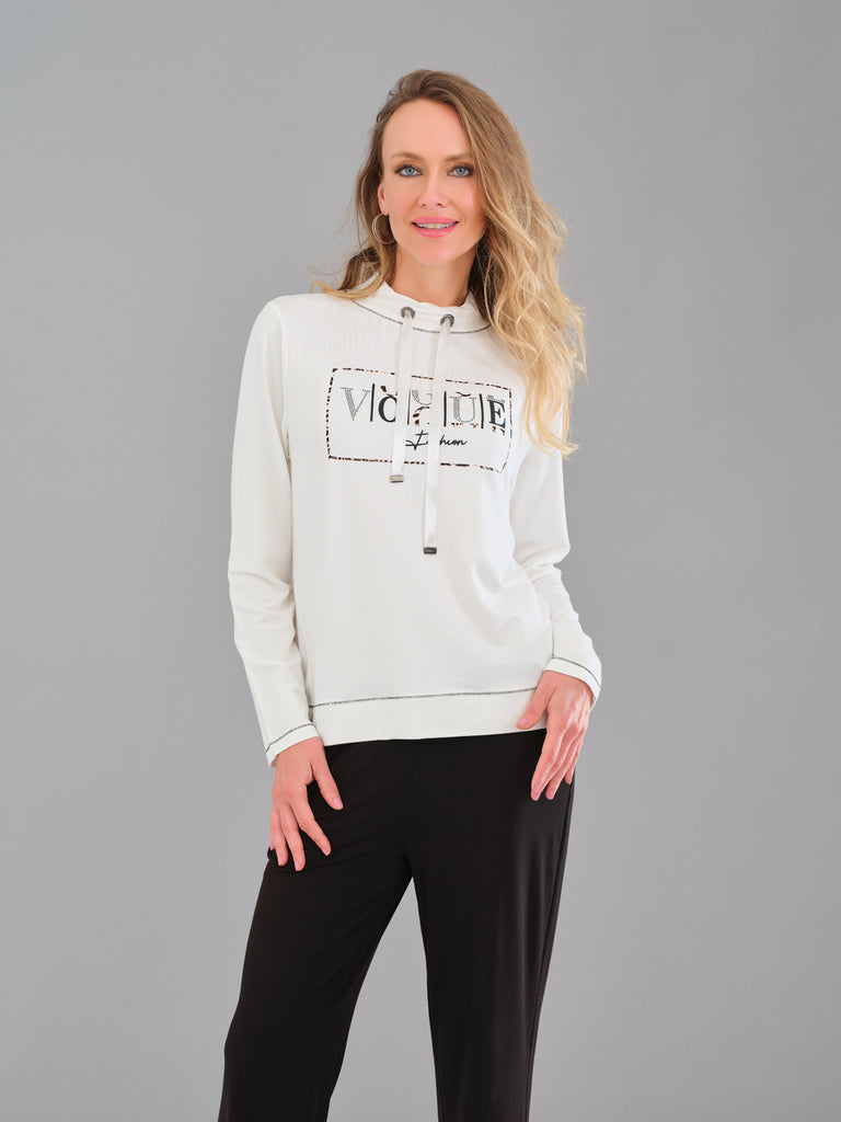 Woman wearing a light gray hoodie with text on a gray background