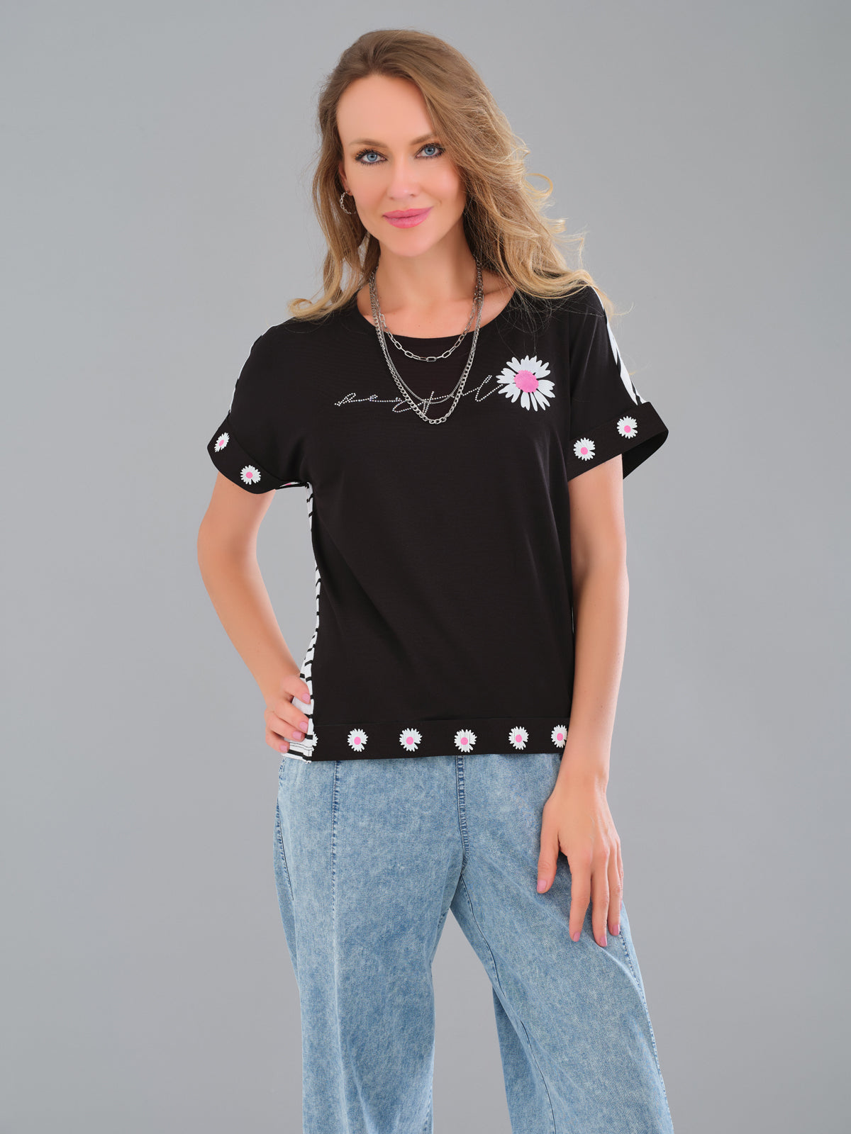 Black t-shirt with front sequin floral print detail