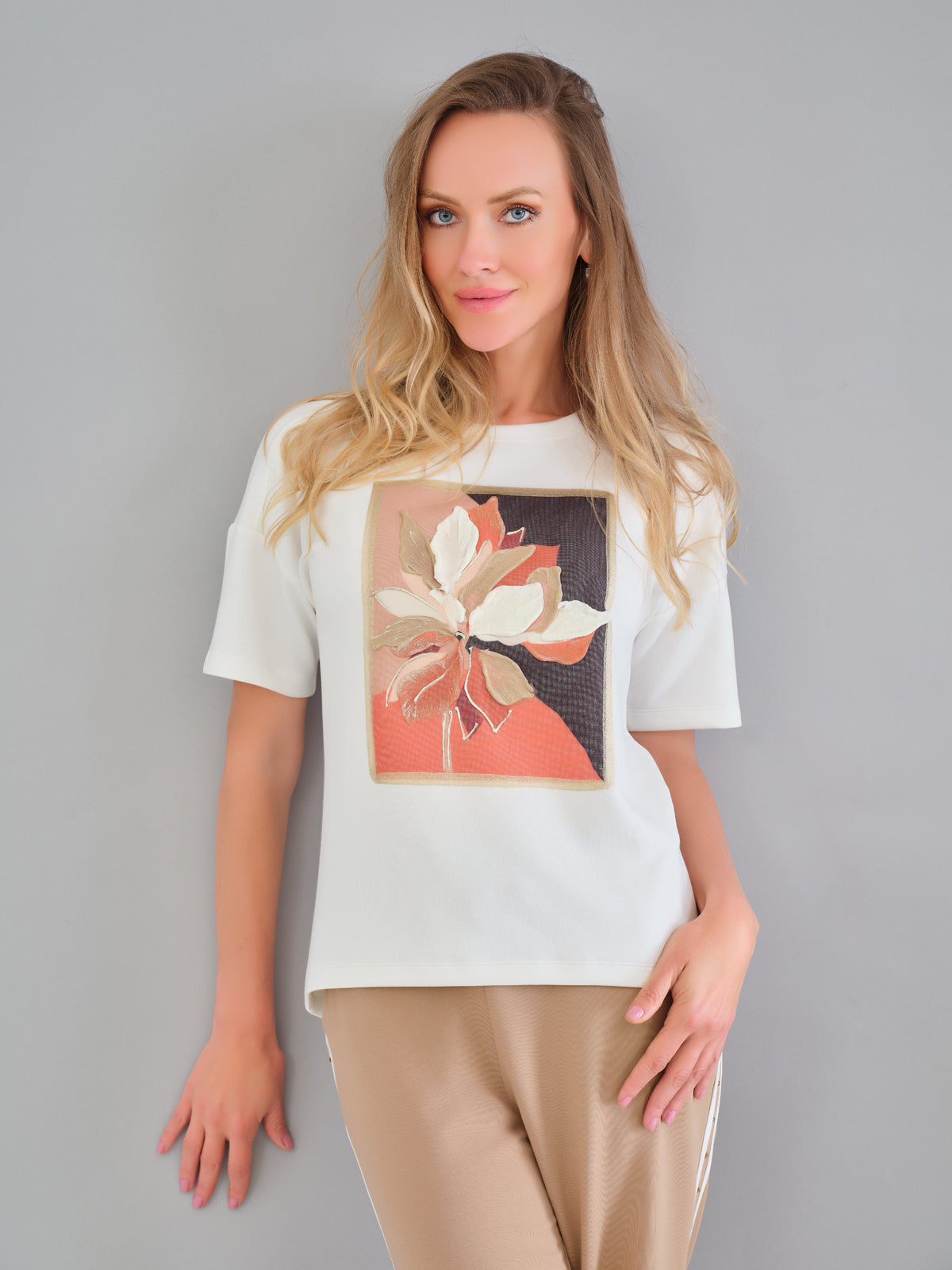 Textured Knit Short Sleeve sweater with front floral print