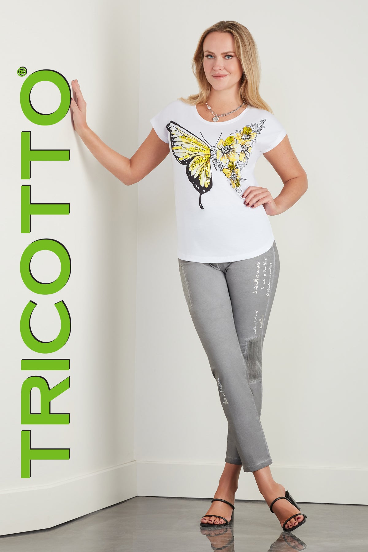 Tricotto T-shirt with sequin butterfly print on front, back is solid white