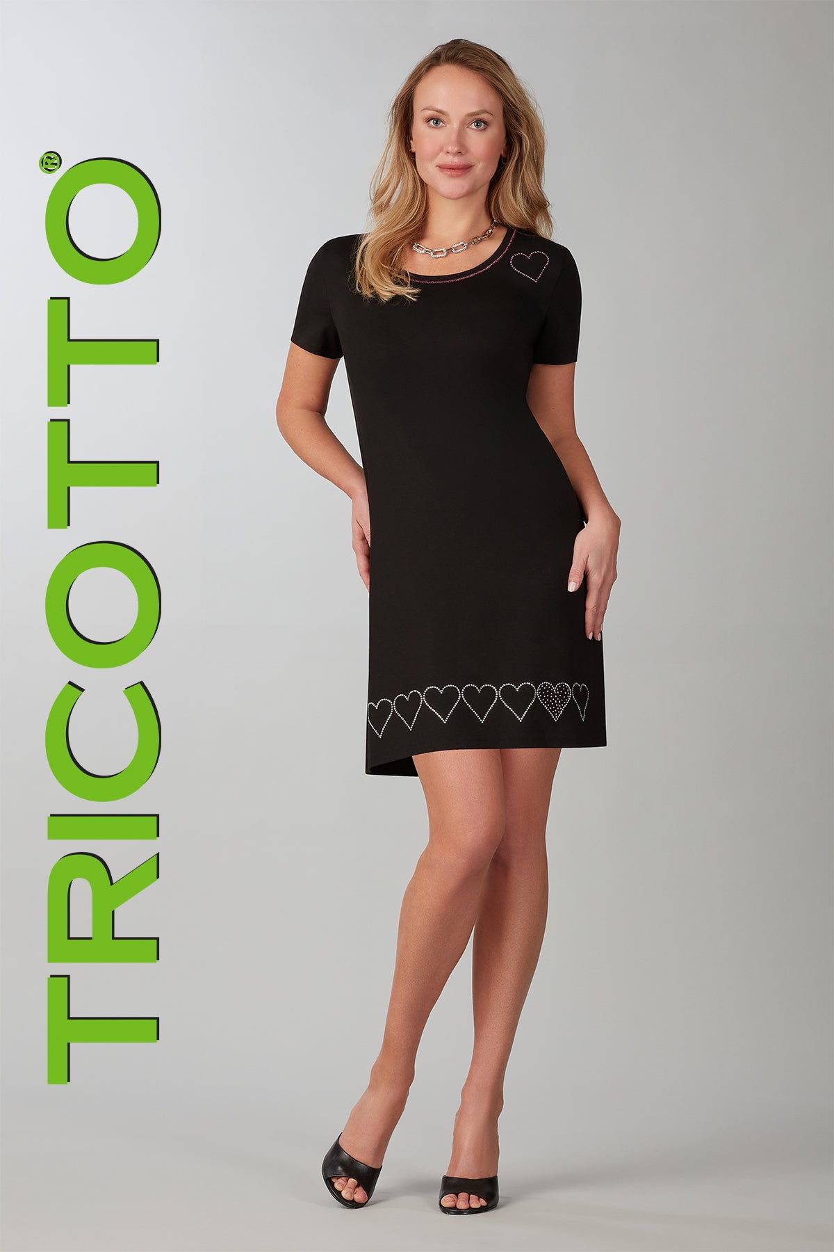 Tricotto Black t-shirt dress with pink sequin heart detail on front