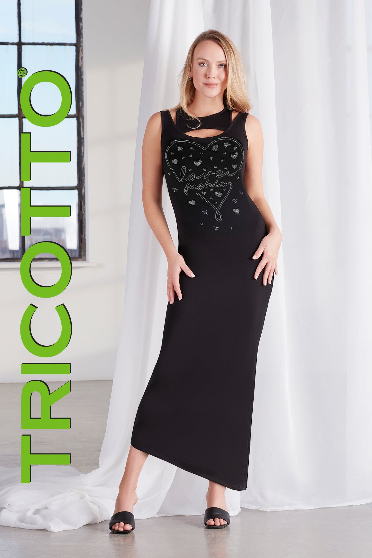 Tricotto black maxi dress with front sequin and shoulder cut outs detail