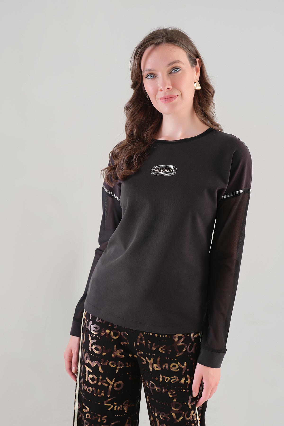 Striking Sequin Top With Sheer Detail. Tricotto 96013