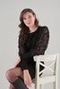 Little Black Dress With Feathered Arm Detail. Tricotto 96209