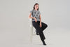 Fashionable cropped length sweater with front bow detail. Tricotto 96210