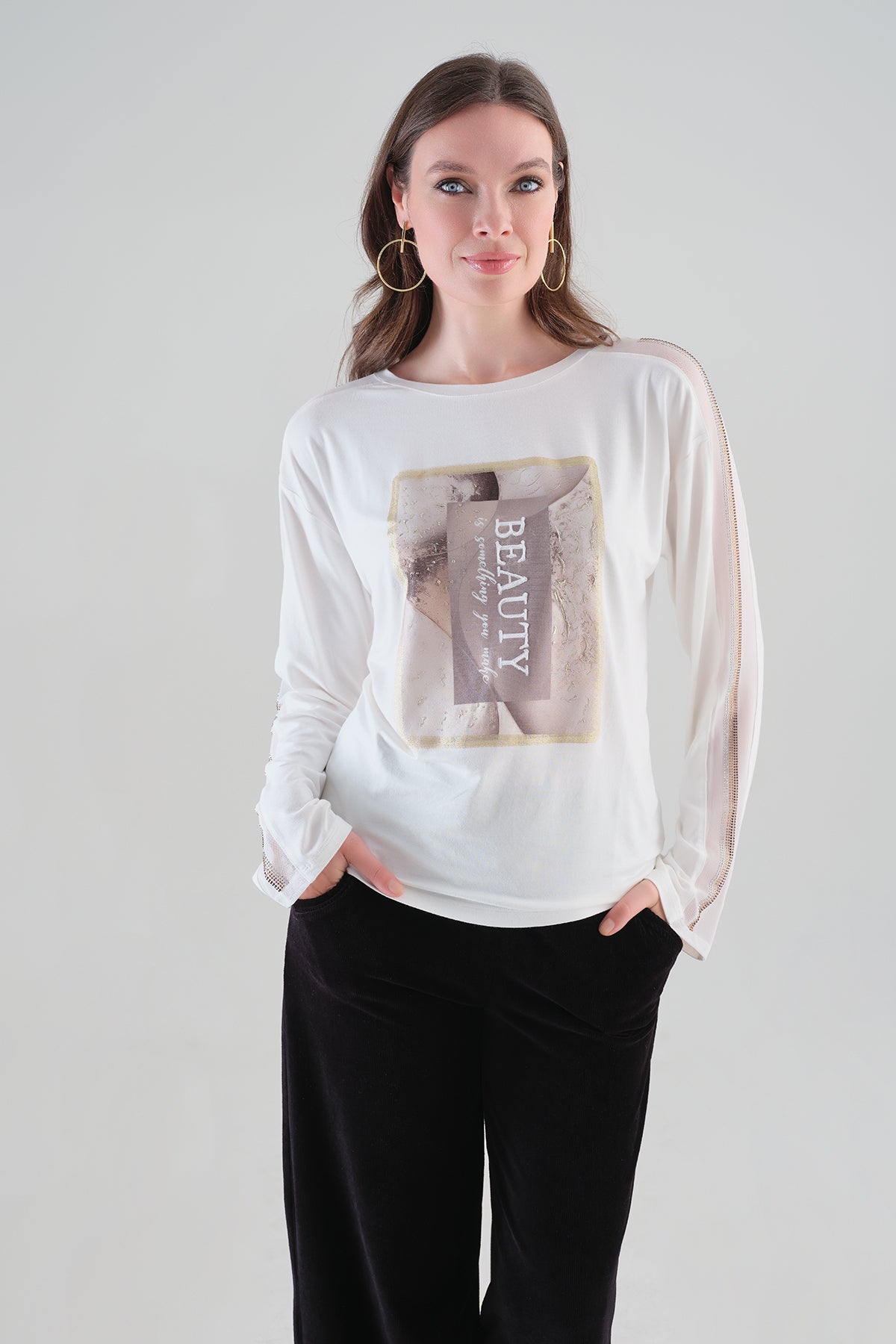 Fashion Print Sweater With Dolman Sleeve and Sequin Arm Detail. Tricotto