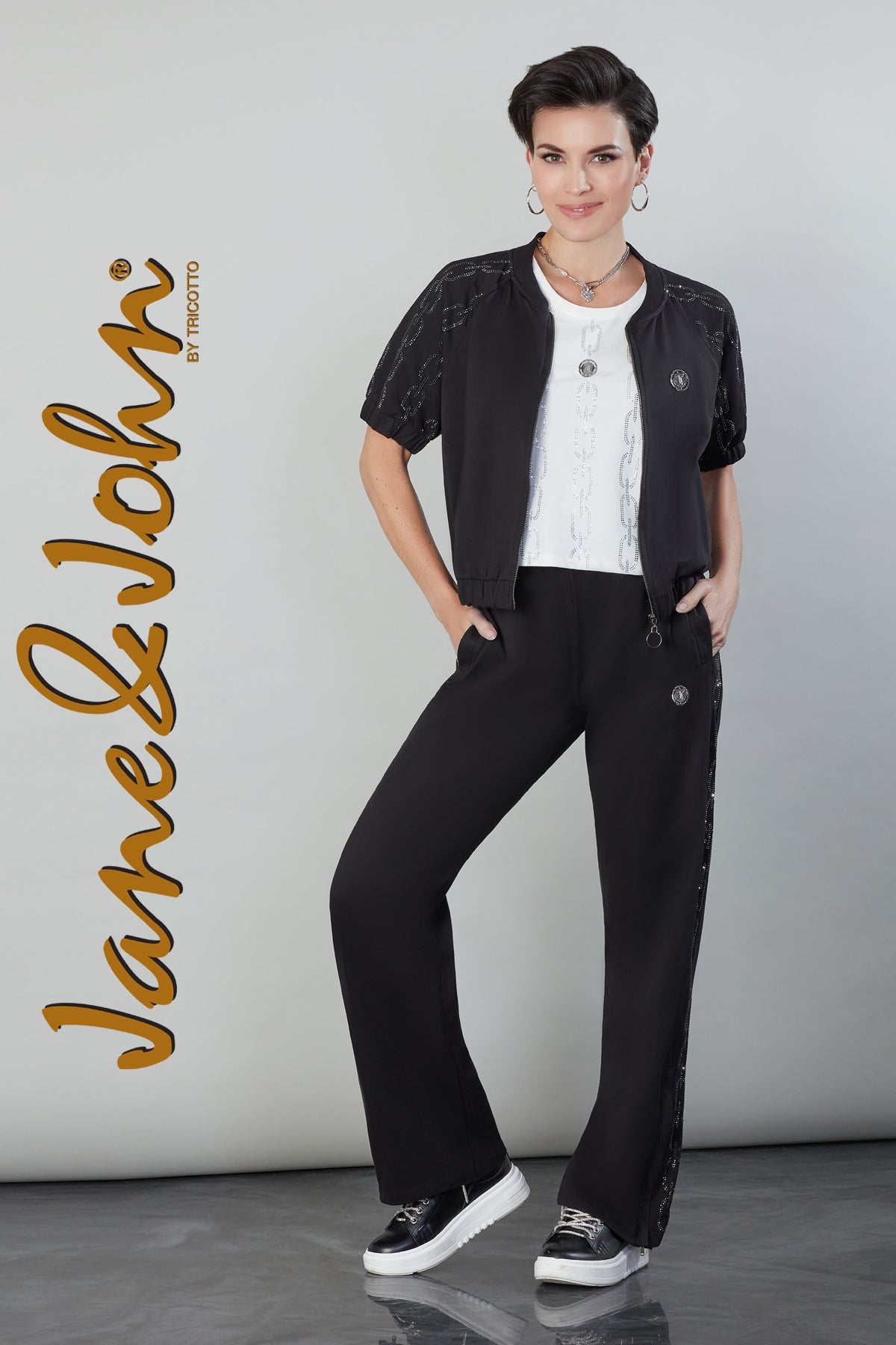 Tricotto Black Relaxed Knit Pant with sequin side detail and working hem zipper