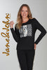 Woman wearing a black long-sleeve top with white text and leopard print, standing against a plain background. The brand 'Jane & John' is visible.