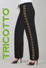 Black pants with gold embroidery on a gray background, featuring the brand 'Tricotto'.