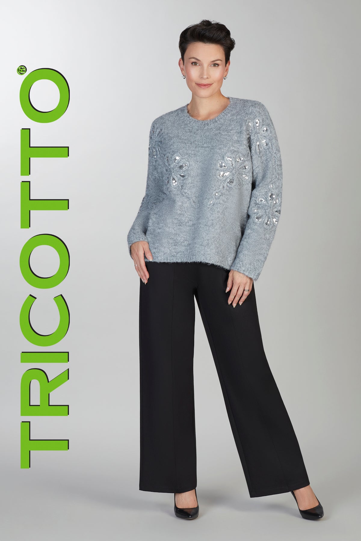Grey eyelash knit sweater with front sequin detail